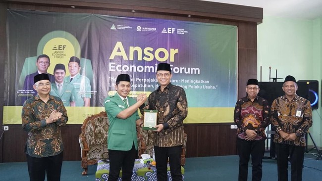 dirjen-pajak-bimo-wijayanto-menyaksikan-penandatangan-kerja-sama-peningkatan-kepatuhan-pajak-djp-jawa-timur-dengan-gp-ansor-ja-1786100204847_169